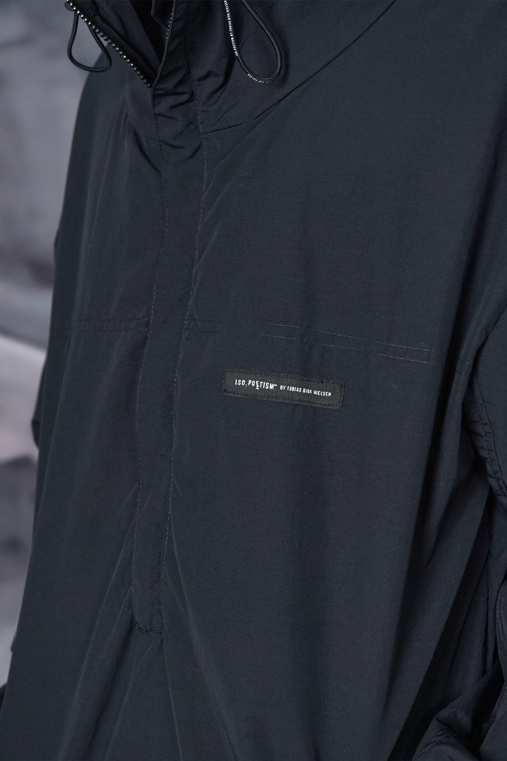 Buy the Iso Poetism Amera Half-Zipped Hooded Anorak W/ Pocket in Black at Intro. Spend £100 for free UK delivery. Official stockists. We ship worldwide.