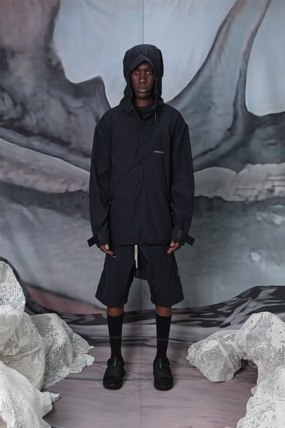 Buy the Iso Poetism Amera Half-Zipped Hooded Anorak W/ Pocket in Black at Intro. Spend £100 for free UK delivery. Official stockists. We ship worldwide.