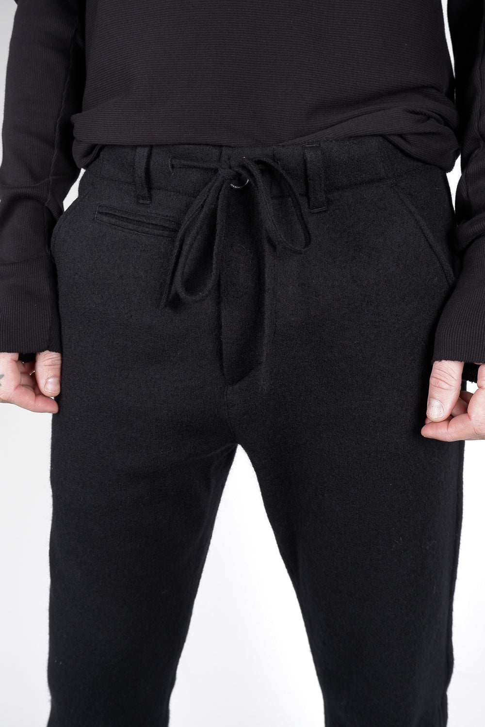 Buy the Hannes Roether Boiled Wool Trousers in Black at Intro. Spend £50 for free UK delivery. Official stockists. We ship worldwide.