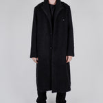 Buy the Hannes Roether Long Boiled Wool Coat in Black at Intro. Spend £50 for free UK delivery. Official stockists. We ship worldwide.