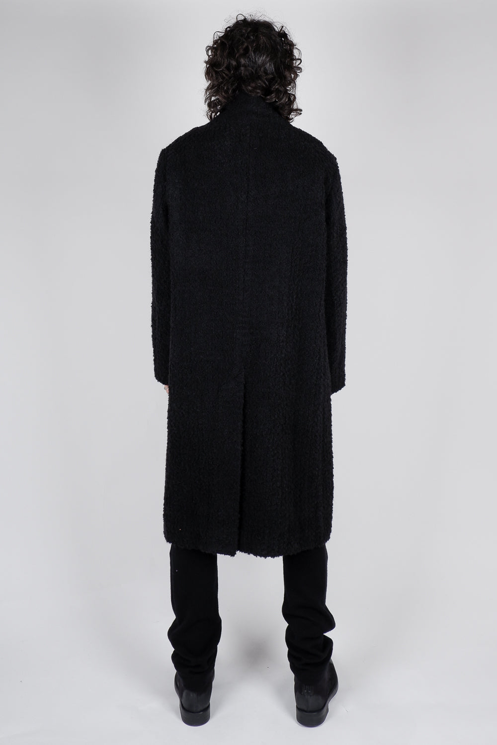 Buy the Hannes Roether Long Boiled Wool Coat in Black at Intro. Spend £50 for free UK delivery. Official stockists. We ship worldwide.