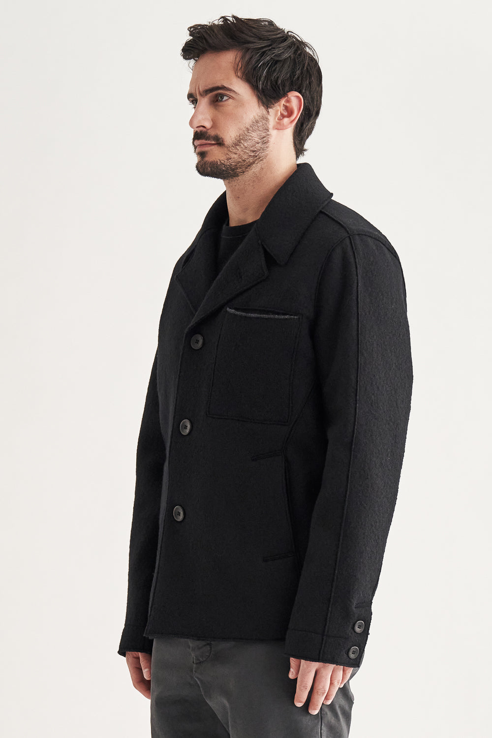 Buy the Transit Raw Cut Boiled Wool Peacoat in Black at Intro. Spend £50 for free UK delivery. Official stockists. We ship worldwide.