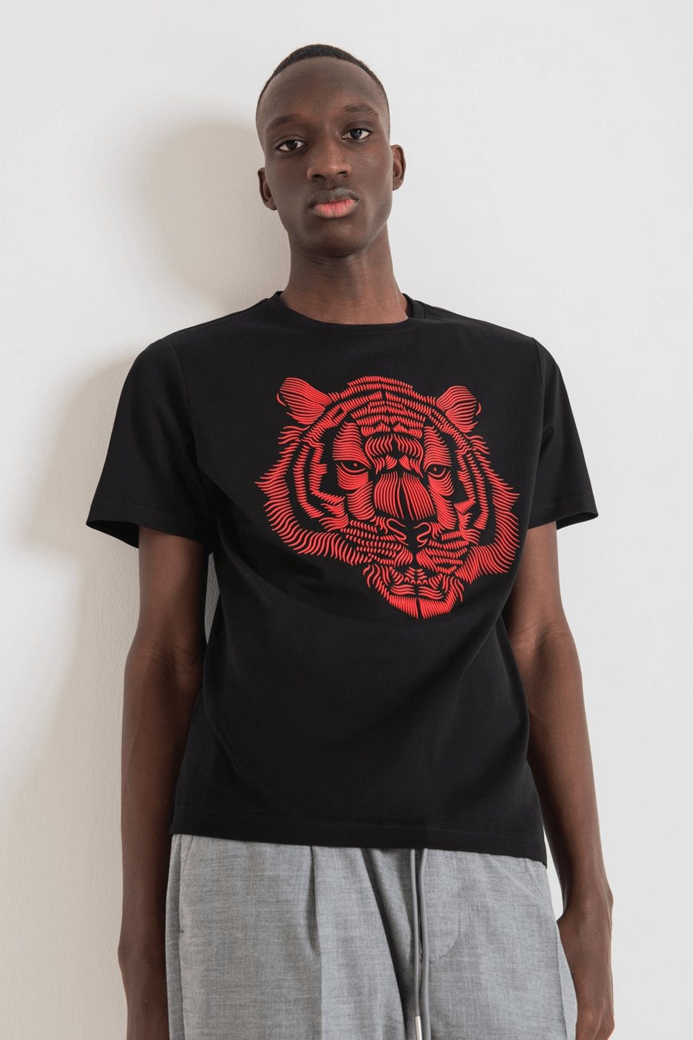 Buy the Antony Morato Slim Fit Tiger Print T-Shirt in Black/Red at Intro. Spend £50 for free UK delivery. Official stockists. We ship worldwide.